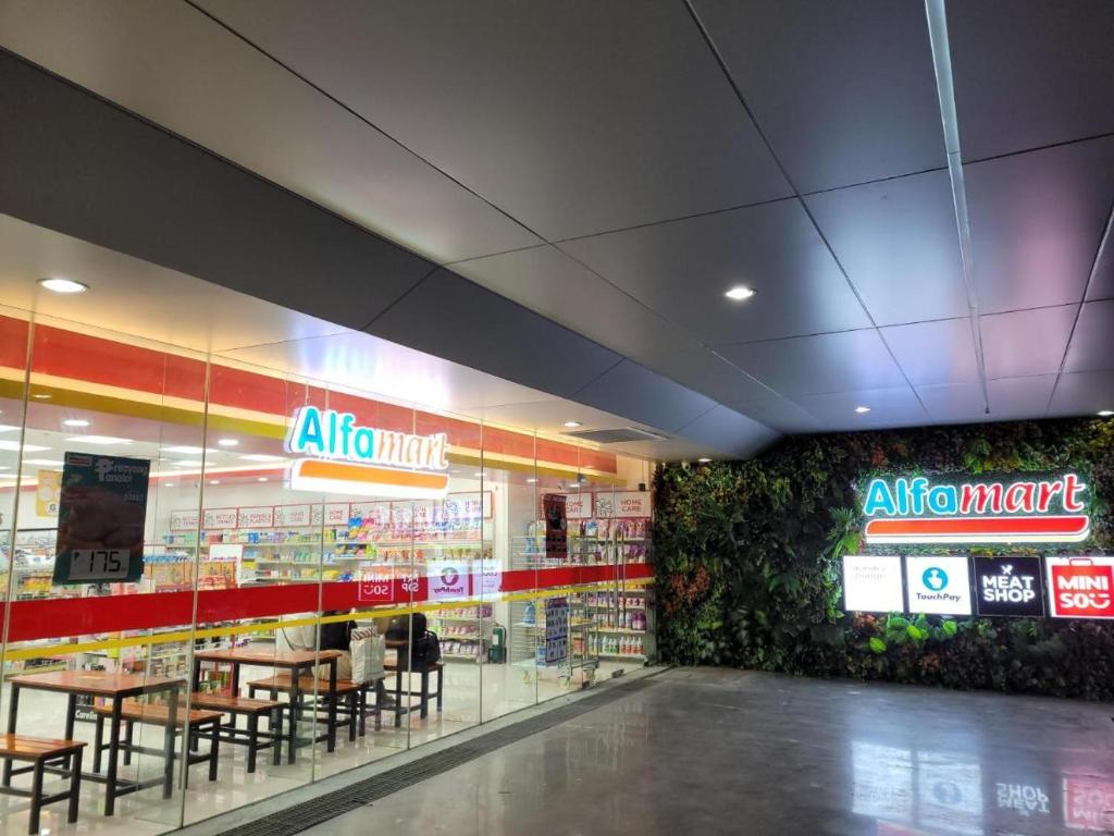 You can buy groceries from the AlphaMart(24hours) at the groud floor